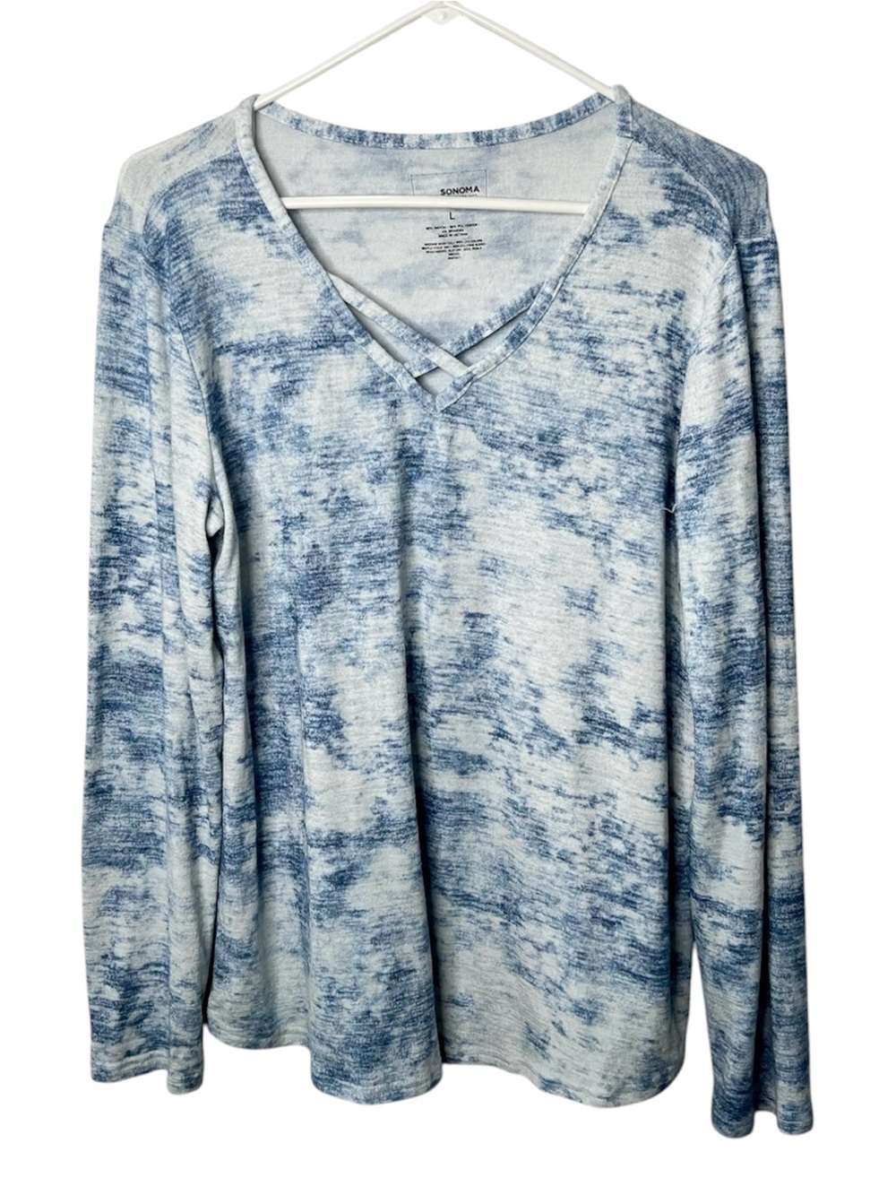 Sonoma knit top size L blue & white cloud print 
Criss cross front